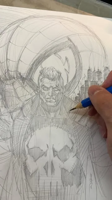 Mike's hand pencilling a Punisher drawing