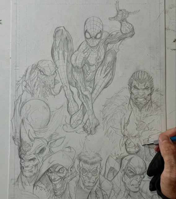 Mike drawing Spider-Man and his villains